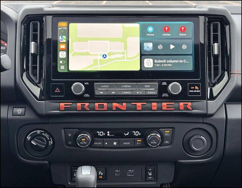 2024 nissan frontier sv - interior infotainment and climate controls on dashboard