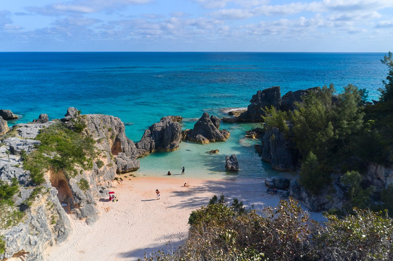 Horseshoe Bay pink sand beach in Bermuda with turquoise water and rock formations