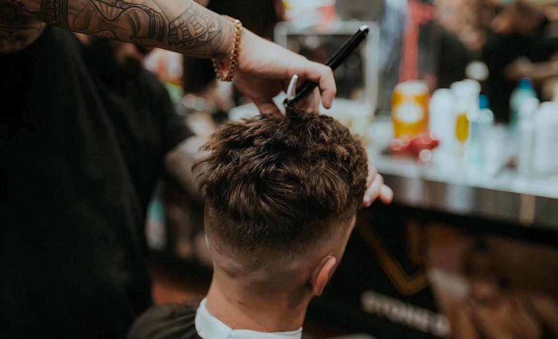 man getting hair cut