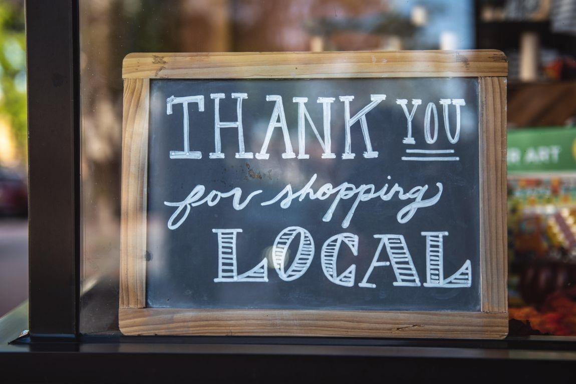 shop local sign in business window