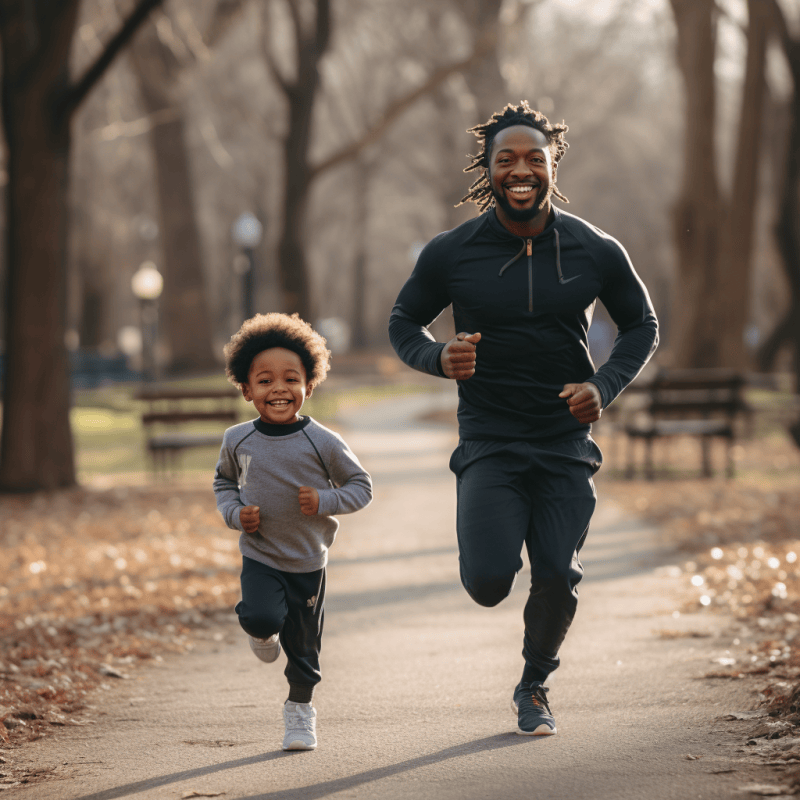 father and son running in the park