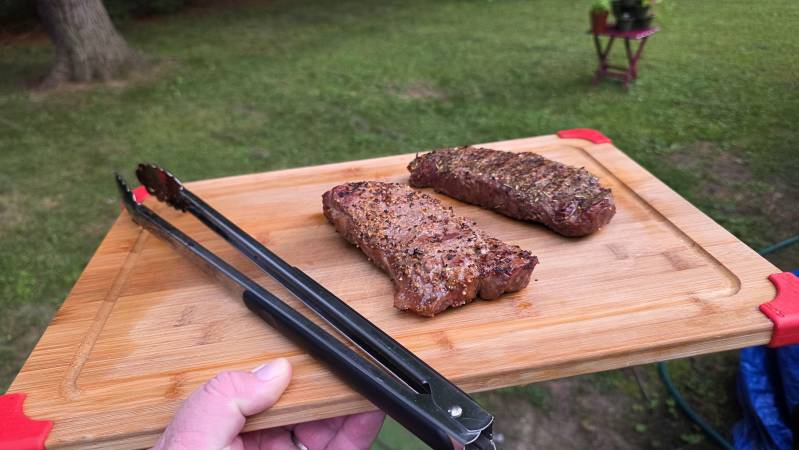 grilling up steaks for dinner