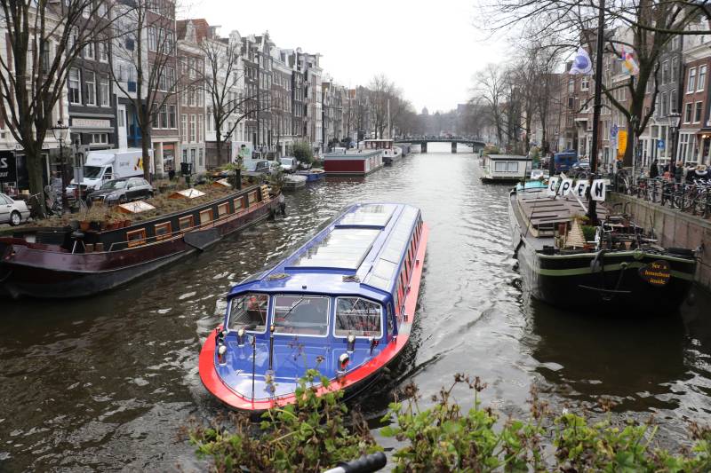 canal boat amsterdam mens solo travel adventure