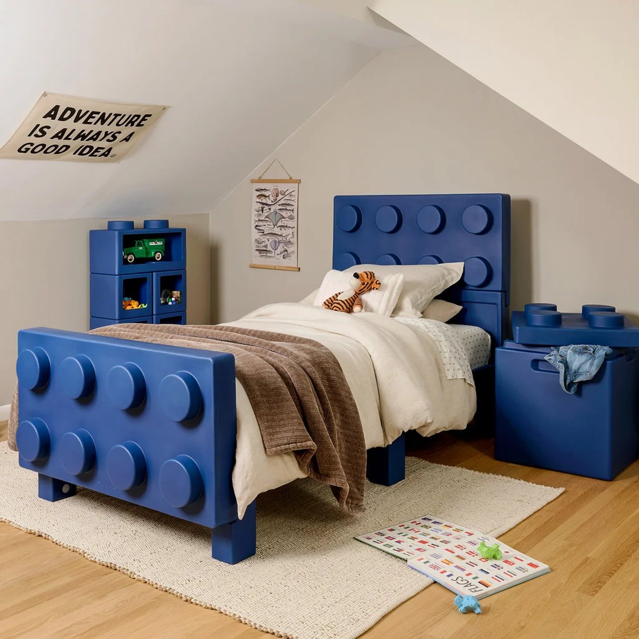 Step2 Contemporary Builders Kids Bedroom Set in blue with block-inspired twin bed, modular storage cubes, and toy box in styled kids room