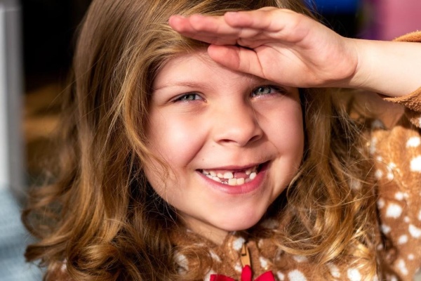 How To Help Your Child Suffering From A Painful Loose Tooth