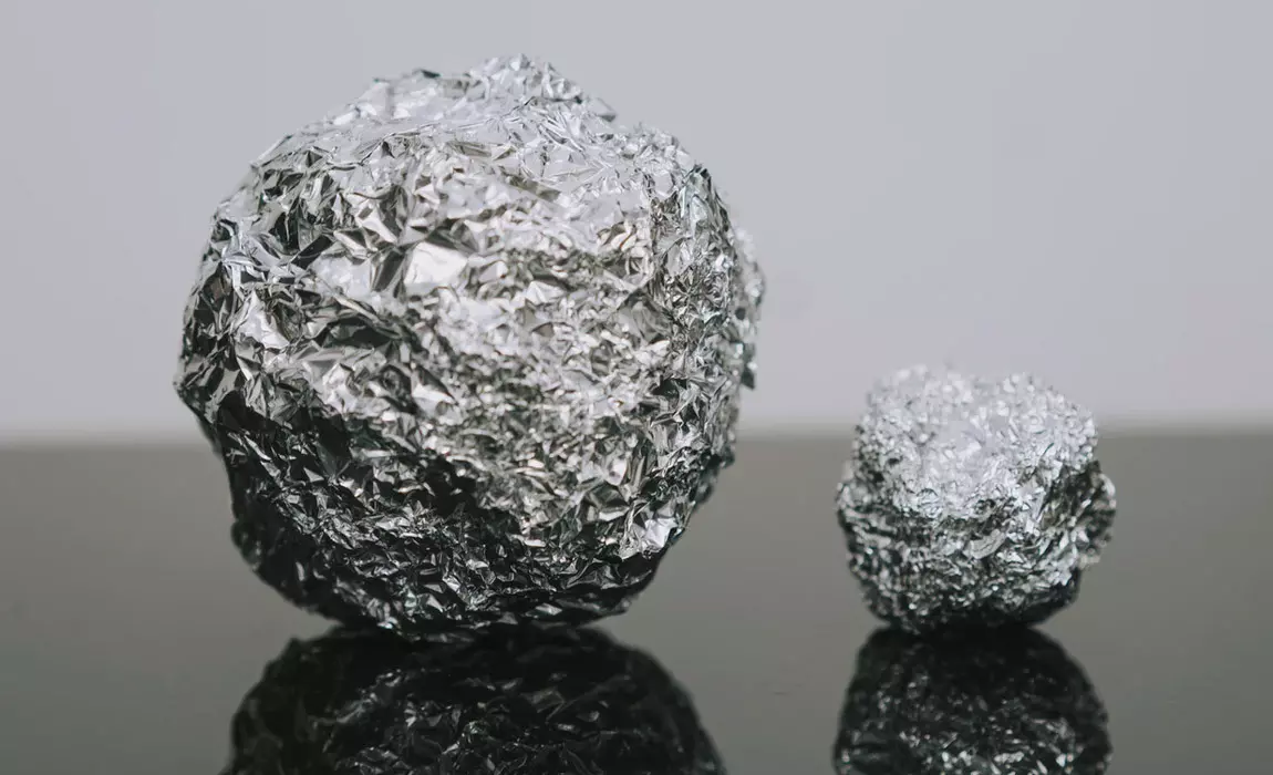 two balls of aluminum foil