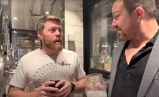 Tom from Bourbon Blog talks with brewmaster Mike on Carnival Celebration