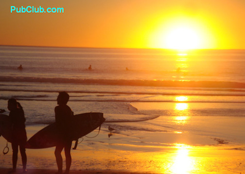 Manhattan Beach El Porto surfers at sunset