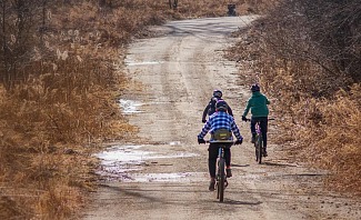 Riding bikes together is a great family fitness activity.