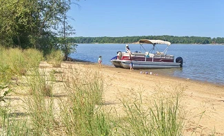 bow rider or pontoon boat for boating on Lake Michigan